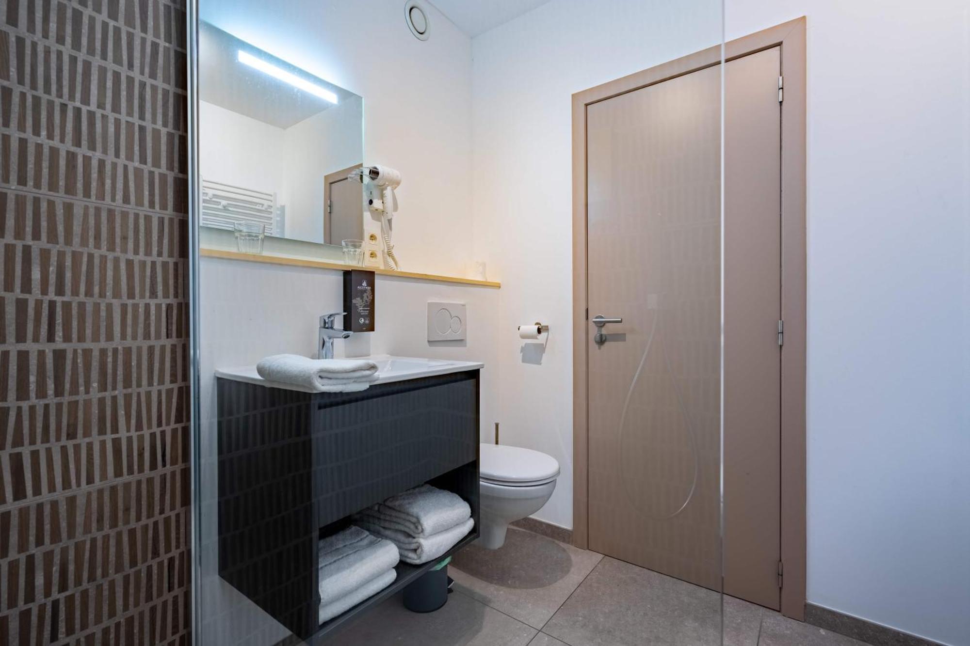 Appart Hotel En Ville Бастонь Экстерьер фото